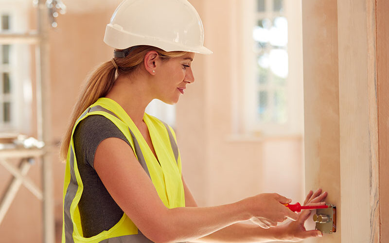 electrician observing safety procedures while working